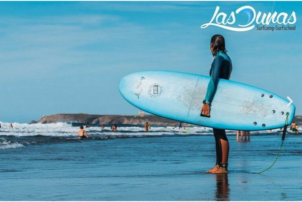 aprender utilizar marca Escuela Surf Las Dunas - Inolvidable Experencia de Surf en Espana